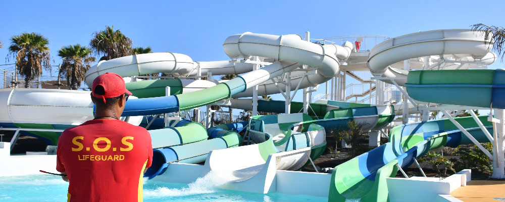 Lifeguard in front of an attraction at Aqualava Water Park