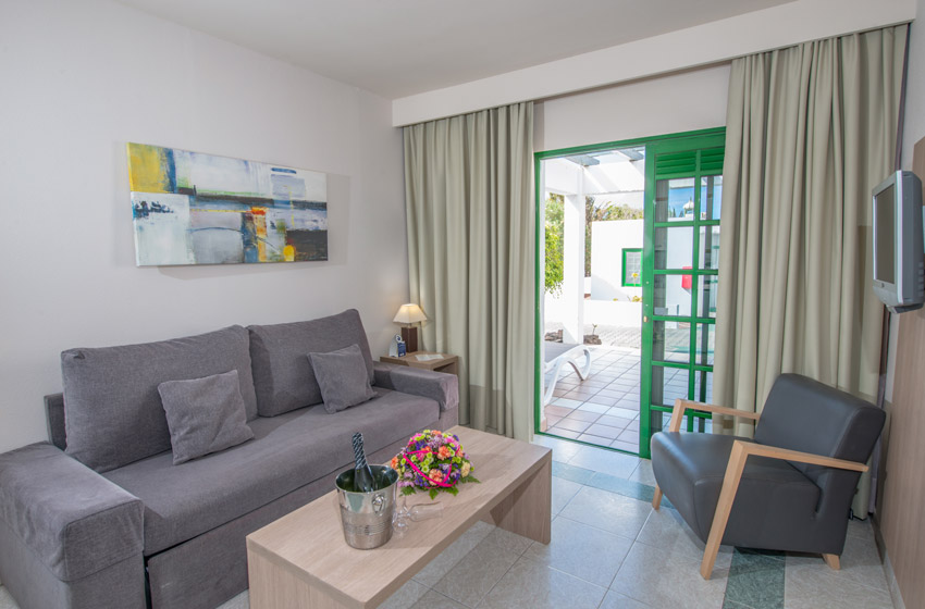 Living room of the apartment at Relaxia Lanzasur Club